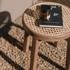 Wooden Stool CARAMIN made of Trembesi with a Seating Surface from Woven Rattan by Soeji