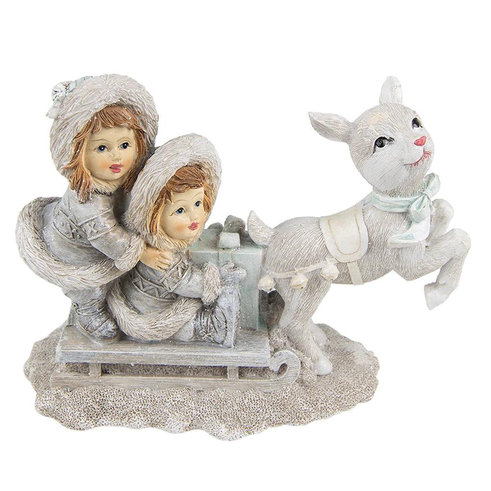 Decoration children on sleigh 16x7x12 cm by Clayre & Eef.