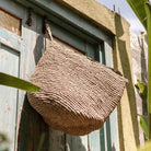 Wall Basket UTARA Hanging Storage Basket made of Raffia by Soeji